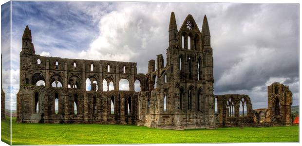 The remains of Whitby Abbey Canvas Print by Tom Gomez