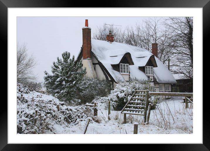The Cottage in the Snow Framed Mounted Print by Ceri Jones
