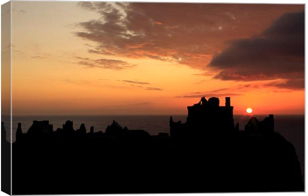 Majestic Sunrise at Dunnottar Castle Canvas Print by Tommy Dickson