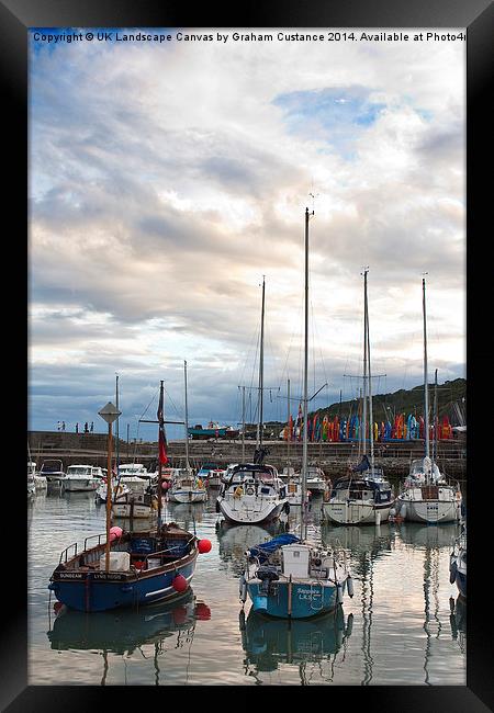 Lyme Regis Harbour Framed Print by Graham Custance