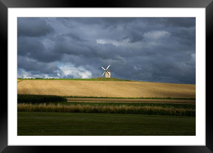 windmill on a stormy day Framed Mounted Print by Eric Fouwels