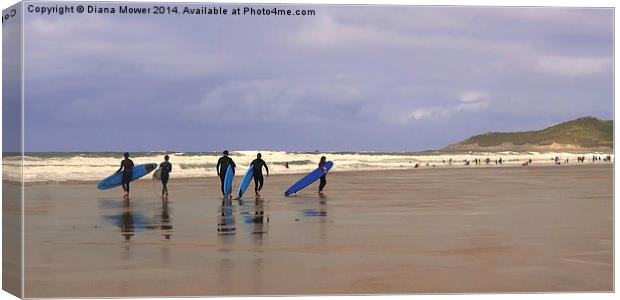 Surfers at  Woolacombe beach, Devon Canvas Print by Diana Mower