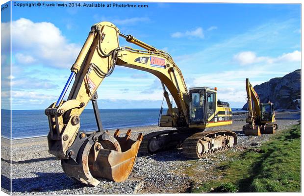 Two JCBs rest overnight on a Welsh beach. Canvas Print by Frank Irwin