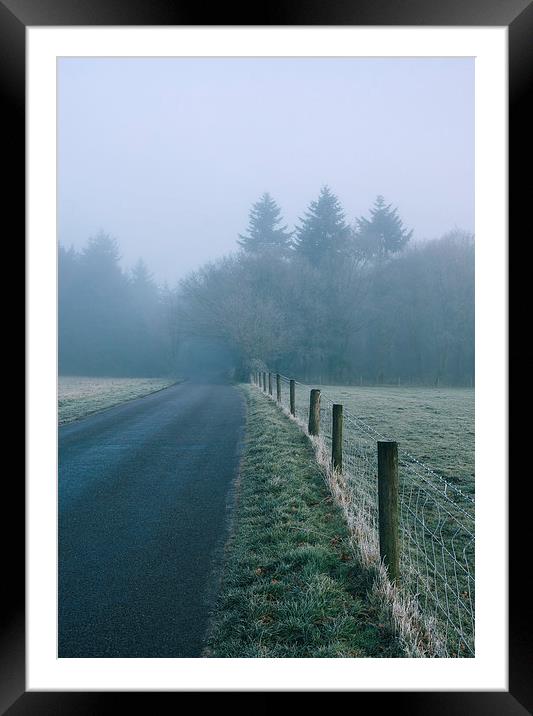 Morning frost and fog over rural country road. Framed Mounted Print by Liam Grant