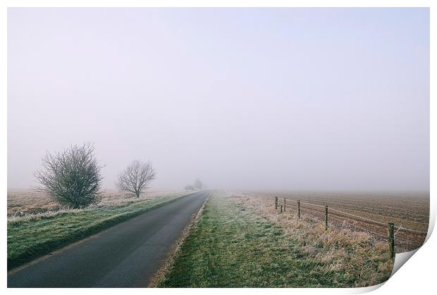 Morning frost and fog over rural country road. Print by Liam Grant