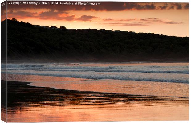 Riding the Waves at Cayton Bay Canvas Print by Tommy Dickson