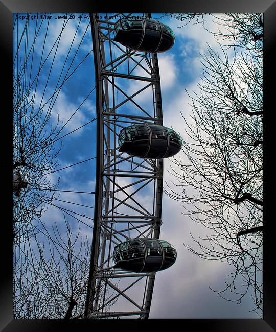 London Eye Through the Trees Framed Print by Ian Lewis