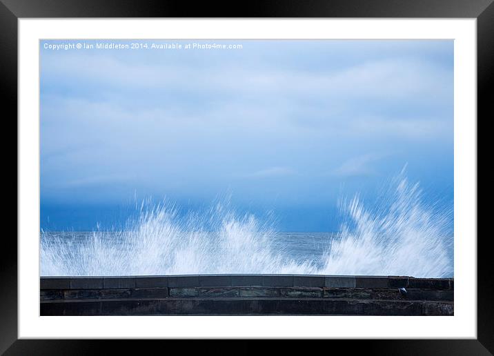 Waves crashing over seawall in Scarborough Framed Mounted Print by Ian Middleton