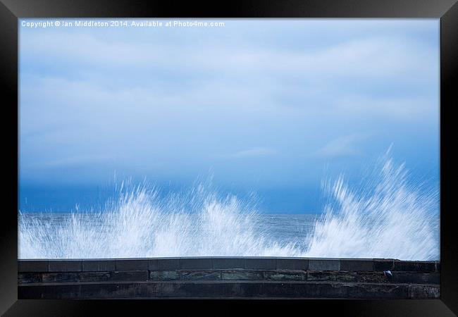 Waves crashing over seawall in Scarborough Framed Print by Ian Middleton