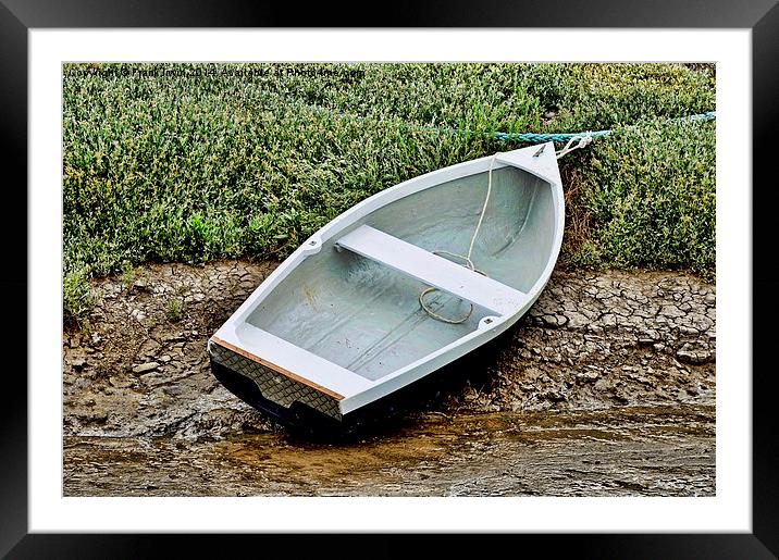 A rowing boat or tender craft beached in Heswall. Framed Mounted Print by Frank Irwin