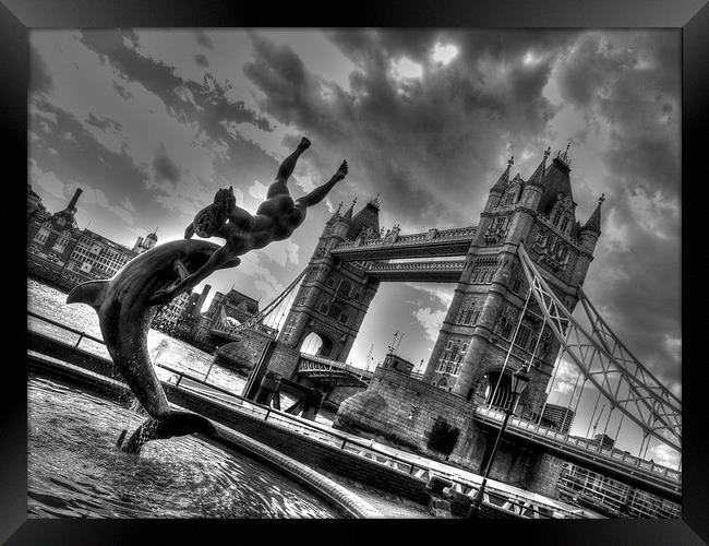 Dolphin by Tower Bridge Framed Print by Andy Huntley