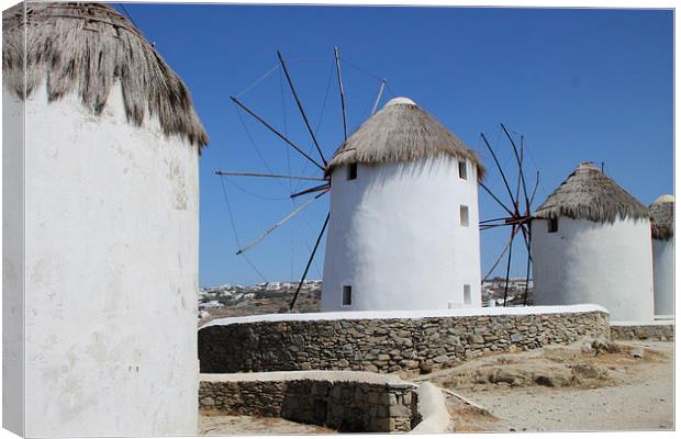 Traditional Windmills on Mykonos Canvas Print by Carole-Anne Fooks