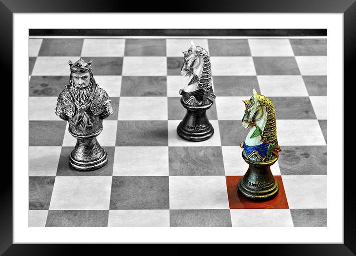 A Knight from a medieval chess set on a convention Framed Mounted Print by Frank Irwin