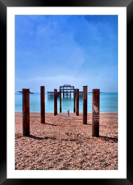 Man looking out to The West Pier Framed Mounted Print by Paul Austen