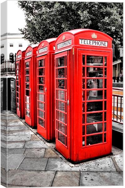 Red Phone Boxes Canvas Print by Paul Austen