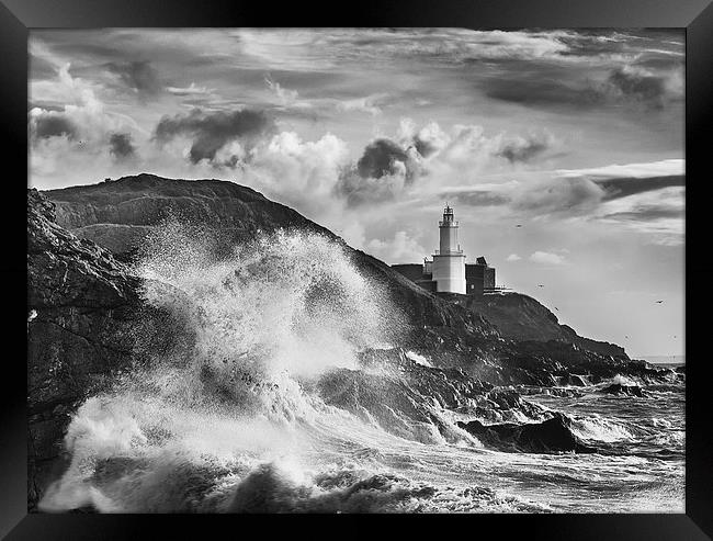 Mumbles Lighthouse Wave Framed Print by Creative Photography Wales