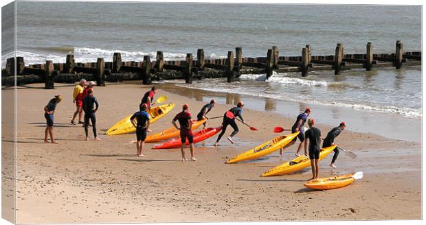 SURFERS AT LOWESTOFT,SUFFOLK Canvas Print by Ray Bacon LRPS CPAGB