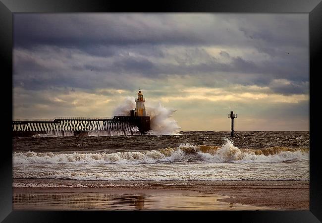 Storm at the harbour mouth Framed Print by Jim Jones