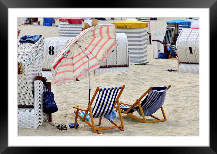 Beach chairs Framed Mounted Print by Susan Sanger