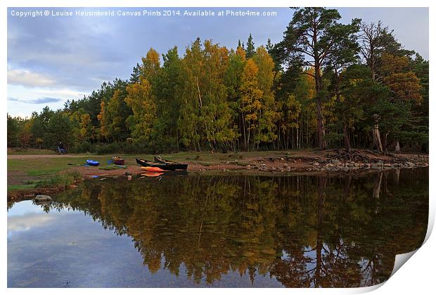 Canoes on the shore at Loch An Eilein Print by Louise Heusinkveld