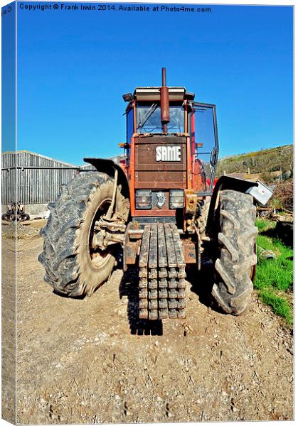 A powerful “SAME” tractor on a farm Canvas Print by Frank Irwin
