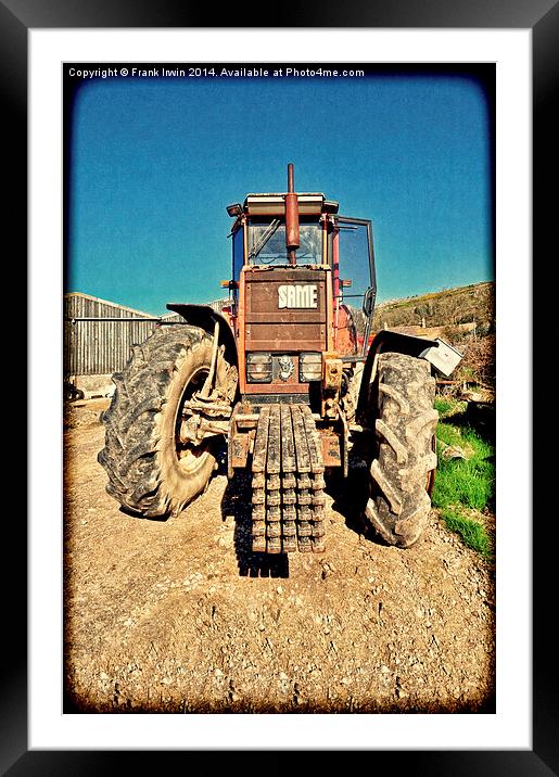 A powerful “SAME” tractor on a farm Framed Mounted Print by Frank Irwin