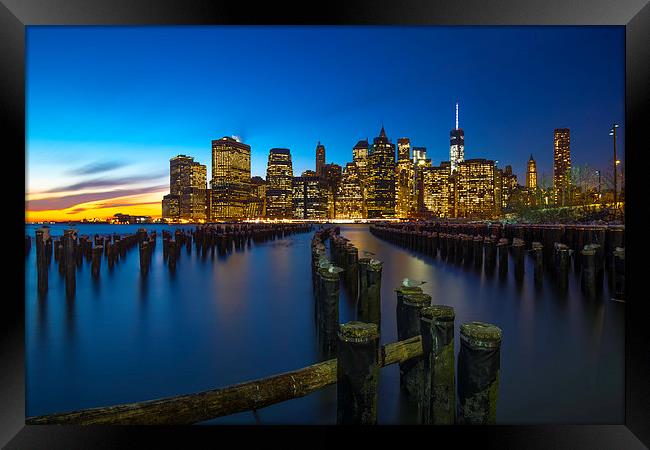 Manhattan Sunset Framed Print by Kevin Ainslie