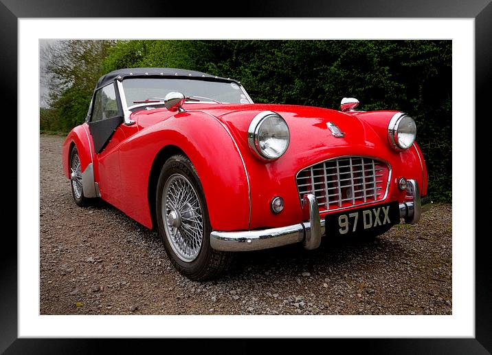 Roaring red TR3 A timeless british classic Framed Mounted Print by Alan Tunnicliffe