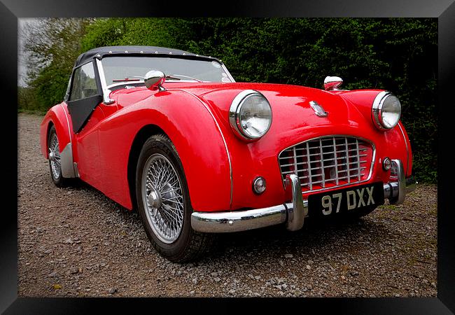 Roaring red TR3 A timeless british classic Framed Print by Alan Tunnicliffe