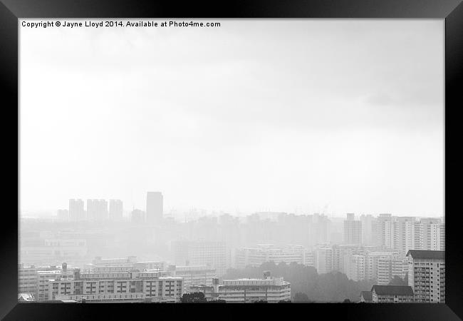 Rain across Singapore Framed Print by J Lloyd