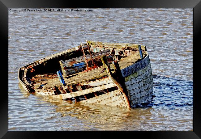 An old rotting boat drifting aimlessly Framed Print by Frank Irwin