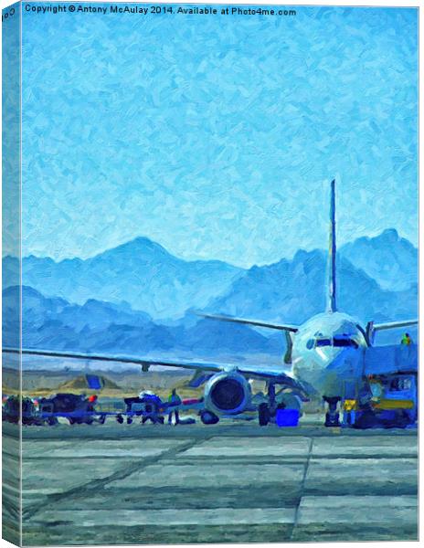 Aeroplane At Airport Canvas Print by Antony McAulay