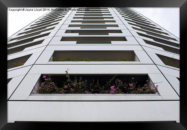 Looking up at Singapore architecture Framed Print by J Lloyd