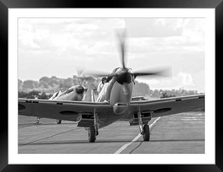 Spitfire pair taxi in - black and white version Framed Mounted Print by Keith Campbell