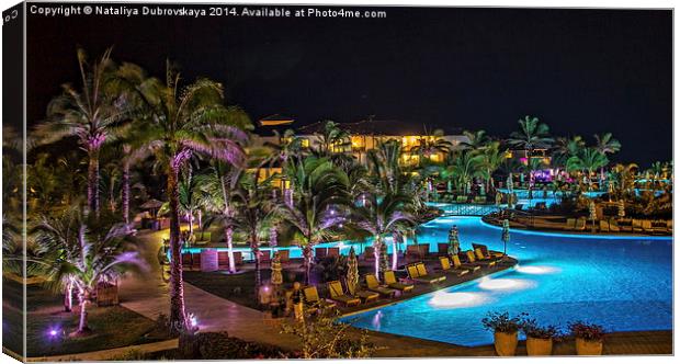 Evening picture of the swimming pool area on a res Canvas Print by Nataliya Dubrovskaya