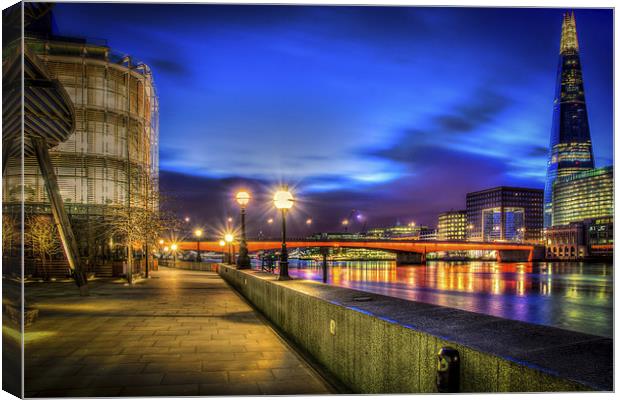 A HDR Walk by the Thames by night Canvas Print by Olavs Silis