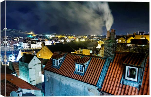 Whitby Smoking Chimney Rooftops at Night Canvas Print by Paul M Baxter