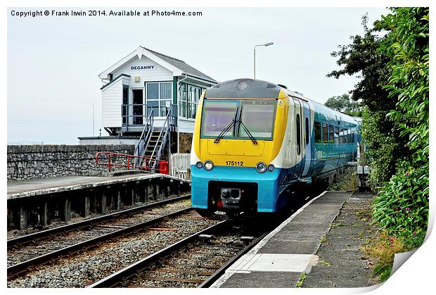 An Arriva train arriving at Deganwy Station Print by Frank Irwin