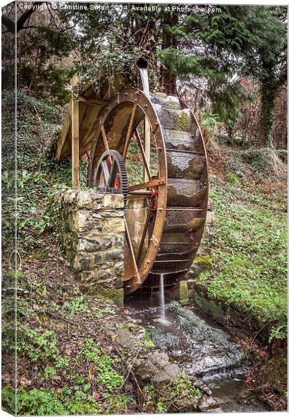 Rusty Waterwheel at Aber Falls Canvas Print by Christine Smart