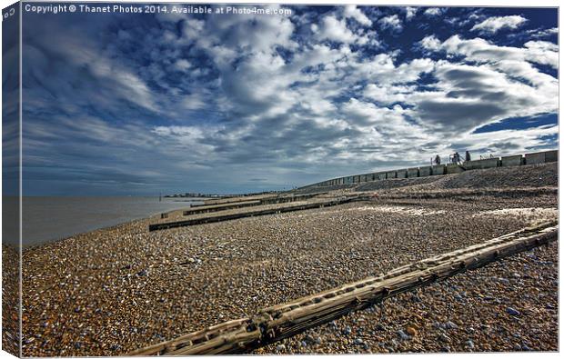 Swirling clouds at the beach Canvas Print by Thanet Photos