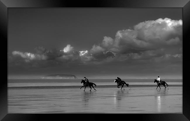 Horses in a storm Framed Print by Dave Hayward