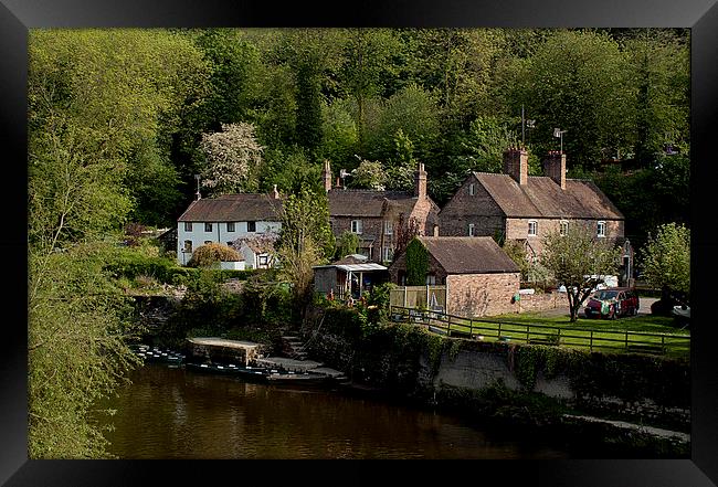 Iron bridge farmhouse on the river Framed Print by Kelly Astley