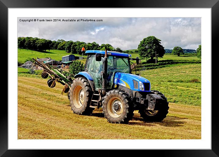 A farm vehicle involved in sileage making Framed Mounted Print by Frank Irwin