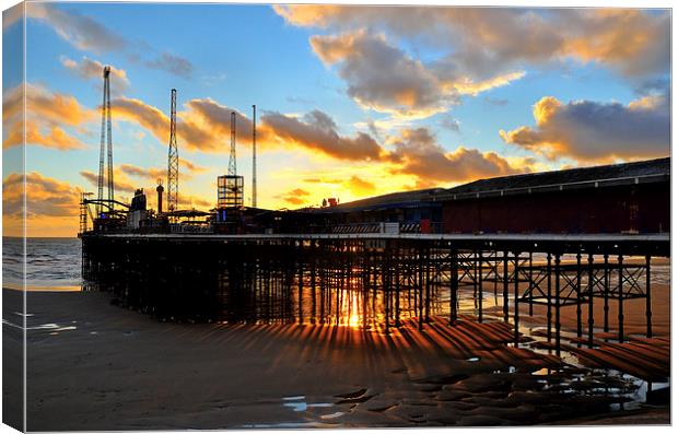 Suns Rays From Under South Pier - Blackpool Canvas Print by Gary Kenyon