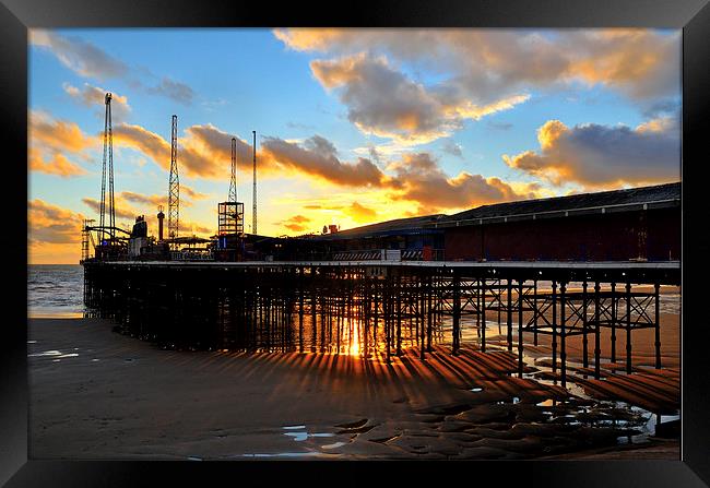 Suns Rays From Under South Pier - Blackpool Framed Print by Gary Kenyon