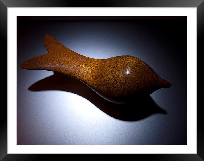 Carved wood bird Framed Mounted Print by Robert Gipson