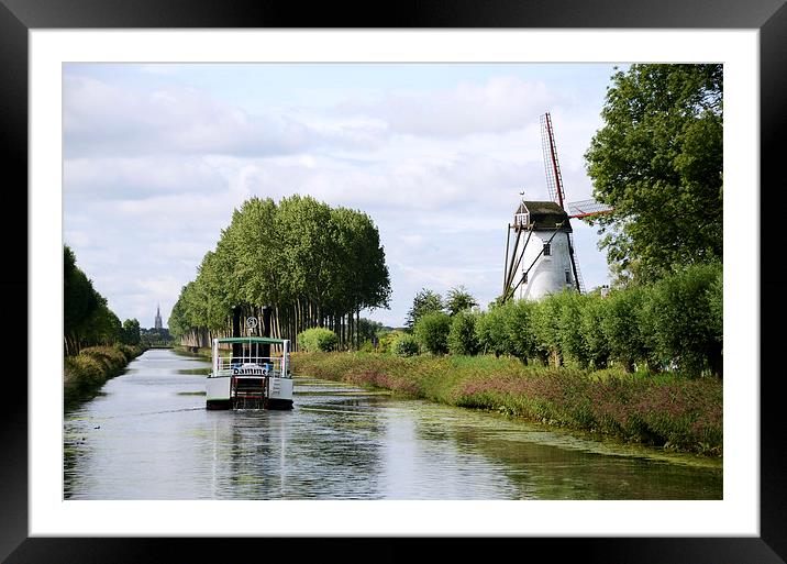 Boat Back to Bruges Framed Mounted Print by Carolyn Eaton