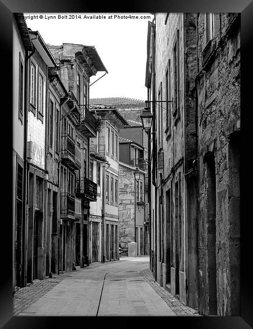 Back Street Oporto Framed Print by Lynn Bolt