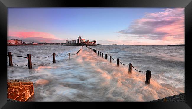 Lighting the causeway Framed Print by mike Davies