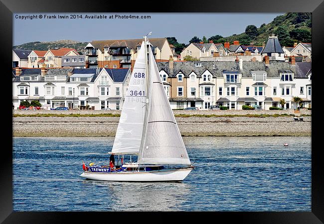 A small yacht sailing slowly along the River Conwy Framed Print by Frank Irwin